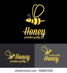 bee logo. vector golden bee icon on black background. abstract bee silhouette