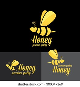 bee logo. vector golden bee icon on black background. abstract bee silhouette