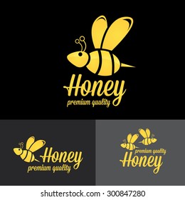 bee logo. vector golden bee icon on black background. abstract bee silhouette