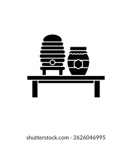 Beehive with Jar of Honey on Wooden Table