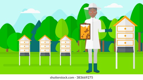 Bee-keeper at apiary.