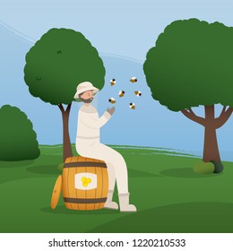 Beekeeper collects honey from bees. Beekeeper in a bee protection suit 