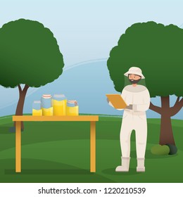 Beekeeper collects honey from bees. Beekeeper in a bee protection suit with a jar of honey.