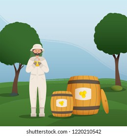Beekeeper collects honey from bees. Beekeeper in a bee protection suit with a jar of honey.