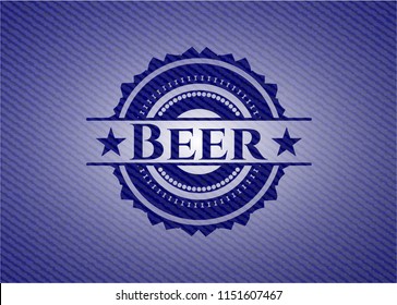 Beer badge with denim background