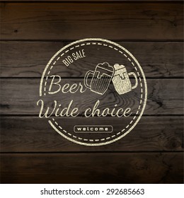 Beer badges logos and labels for any use, logo templates and design elements for beer house, bar, pub, brewing company, brewery, tavern, restaurant, on wooden background texture