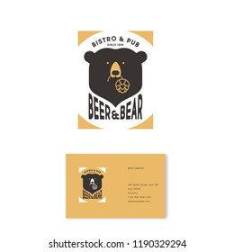 Beer and bear pub logo. The head of bear and letters emblem. Craft beer emblem. Bear keeps hop cones. Business card.