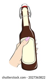 Beer bottle. Female hands hold a bottle of beer from a dark glass. Alcoholic intoxicating drink