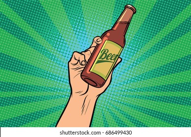 beer bottle in hand. Pop art retro vector illustration