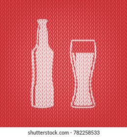 Beer bottle sign. Vector. Knitted white icon on a red knitted background.