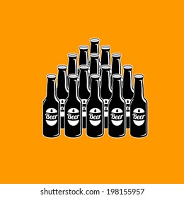 beer bottles grouped to shape of pyramid