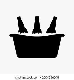 Beer bottles in a metal tub with ice cubes. Black silhouette. Vector picture and simple icon.