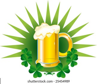 Beer with clover on green background