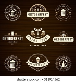 Beer festival Oktoberfest celebrations retro style labels, badges and logos set with beer mug on wooden background. Vector illustration.