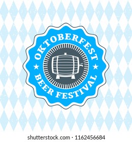 Beer festival Oktoberfest celebrations. Vintage beer badge on the traditional Bavarian linen flag background