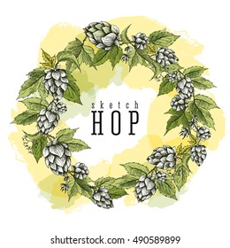 Beer hops round frame hand drawn hops branches with leaves, cones and flowers, color sketch and engraving design. All element isolated.