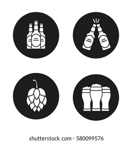 Beer icons set. Hop cone, beer bottles and glasses. Vector white silhouettes illustrations in black circles