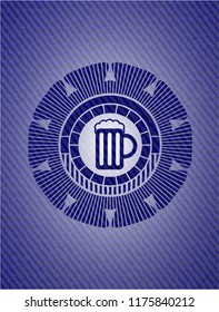 beer jar icon inside emblem with denim high quality background