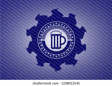 beer jar icon inside emblem with jean background