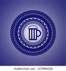 beer jar icon inside emblem with jean background