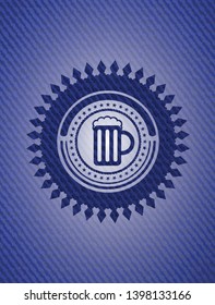 beer jar icon inside emblem with denim high quality background