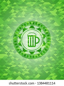 beer jar icon inside green emblem. Mosaic background