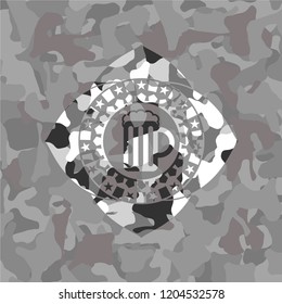 beer jar icon inside grey camo emblem