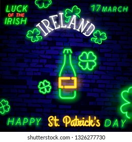 Beer neon sign, bright signboard, light banner. Beer logo, emblem. Theme St. Patrick's Day. A clover leaf on a dark background with a neon light effect for a festive decoration for St. Patrick's Day.