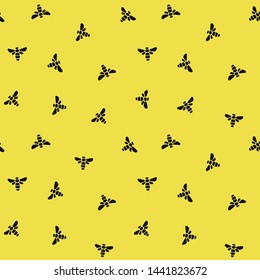 Bees on a yellow background . World bee day. Seamless pattern for printing on fabric, knitwear, wrapping paper. Vector design.