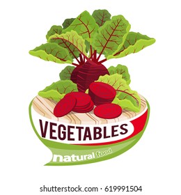 Beet with leaves on a cutting board