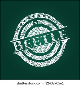 Beetle chalkboard emblem on black board