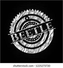 Beetle chalkboard emblem written on a blackboard