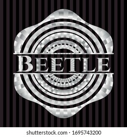 Beetle silvery badge or emblem. Vector Illustration. Mosaic.