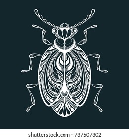 Beetle with swirling decorative ornament. 