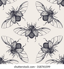 Beetles seamless pattern. Vintage hand drawn insects with spreaded wings.