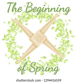 Beginning of spring holiday. Brigid's Cross in a wreath of green leaves