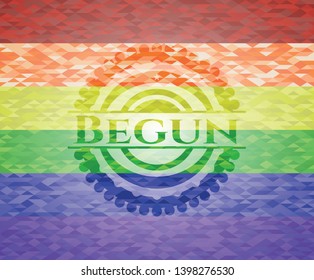 Begun on mosaic background with the colors of the LGBT flag