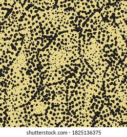 Fondo beige con salpicaduras negras y contornos confusos. Grunge gráficos.