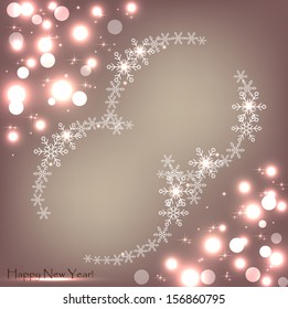 Beige background with sparkles and snowflakes
