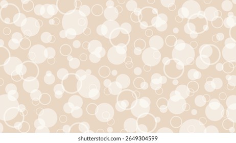 Beige background and white polka dot pattern as blur or snow drops. Luxury wallpaper for a holiday or packaging.