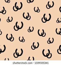Beige and black seamless vector background with elements of horse shoes. Perfect for fabric, wall paper, gift wrapping paper, scrapbooking, quilting, home decor, invitations and projects.