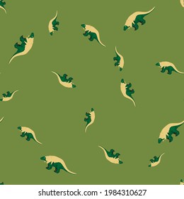 Beige colored dinosaurs random ornament seamless pattern. Green background. Wildlife nature backdrop. Stock illustration. Vector design for textile, fabric, giftwrap, wallpapers.