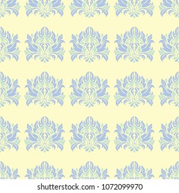 Beige colored floral seamless pattern. Background with light blue and green flower elements for wallpapers, textile and fabrics