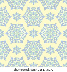 Beige colored floral seamless pattern. Background with light blue and green flower elements for wallpapers, textile and fabrics