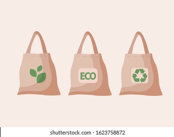 Beige fabric cloth or paper bag. Bags with recycling, green leaf and ECO symbols. Replacement plastic bags. Save Earth ecology. Flat vector illustration isolated on  beige background