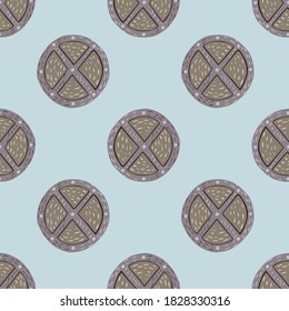 Beige and grey colored wood shield seamless pattern. Circle weapon ornament on light blue background. Designed for fabric design, textile print, wrapping, cover. Vector illustration.