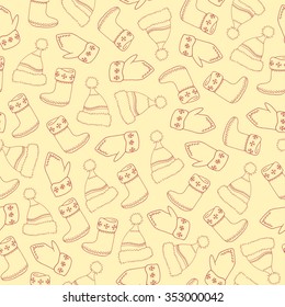 Beige hand drawn seamless pattern with winter clothes. Decorative vector ornamental background with mitten, felt boot, christmas stocking, hat. Can be used for textile design, bag template, packaging.