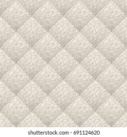 Beige leather upholstery vector seamless pattern. Quilted leather texture. Animal skin texture. Can be used in web design and graphic design.