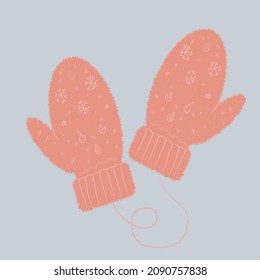 beige mittens with an ornament on a blue background