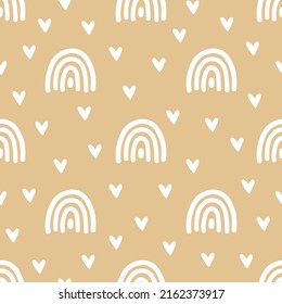 Beige seamless pattern with white hearts and rainbows.